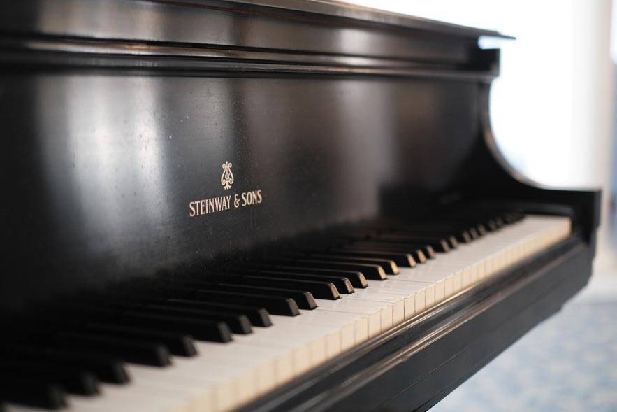 An interior shot of a piano at the Imboden Creek Gardens facility, from the Imboden Creek Gardens Gallery.